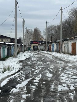 Гараж 18,3 кв.м. и земельный участок 21,8 кв.м. в Кемеровской обл. 